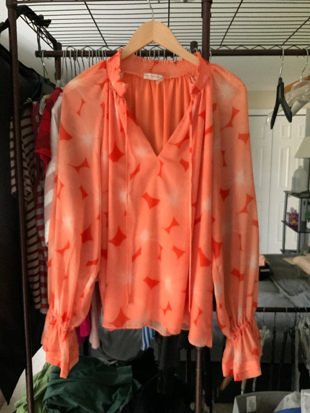 Women’s peasant blouse in sheer orange and white abstract overlay, lined